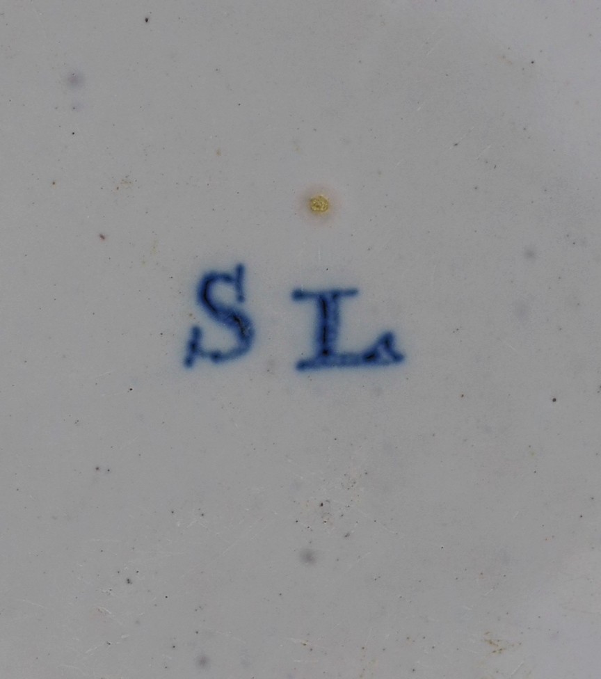 A large Strasbourg faience octagonal dish, c.1720-40, 35.5cm wide